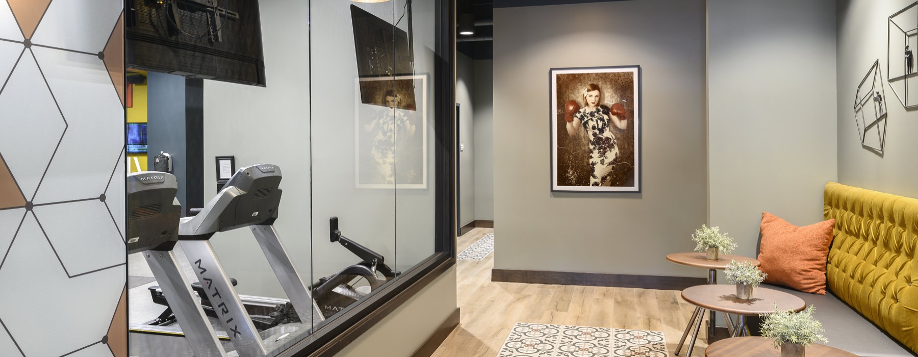 a room with a couch and tables